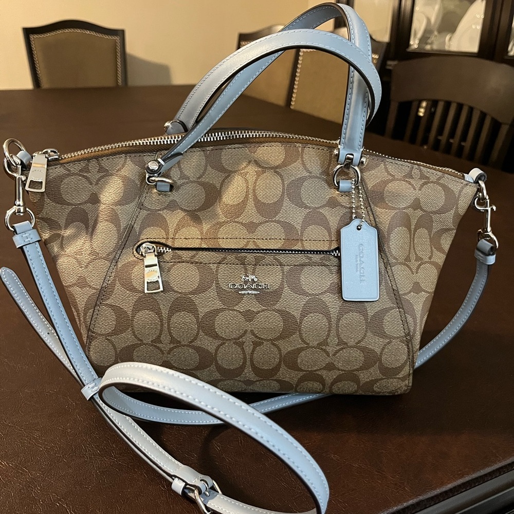 Coach satchel in signature canvas.